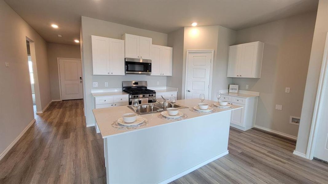 Kitchen - All Home and community information, including pricing, included features, terms, availability and amenities, are subject to change at any time without notice or obligation. All Drawings, pictures, photographs, video, square footages, floor plans, elevations, features, colors and sizes are approximate for illustration purposes only and will vary from the homes as built.
