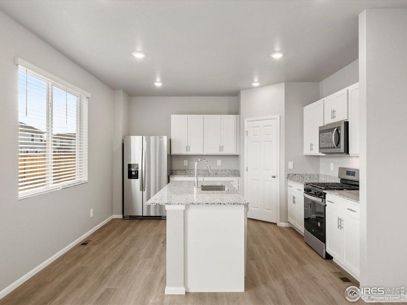 Furnished interior view inside a new home in Revere at Johnstown, Johnstown (Image 4).