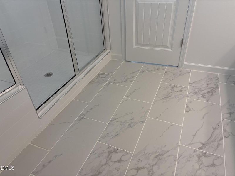 owner's bath tile floor