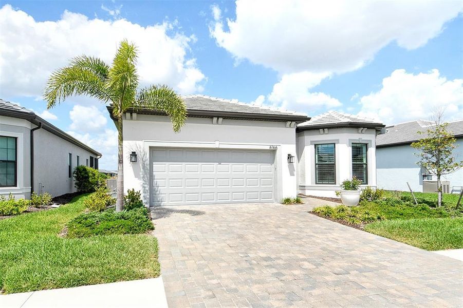 Front exterior of a new home in , Nokomis, FL, highlighting curb appeal (Image 23).
