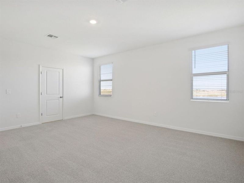 Spacious, unfurnished interior of a new home in Coasterra - Reserve Series, Palmetto (Image 11).
