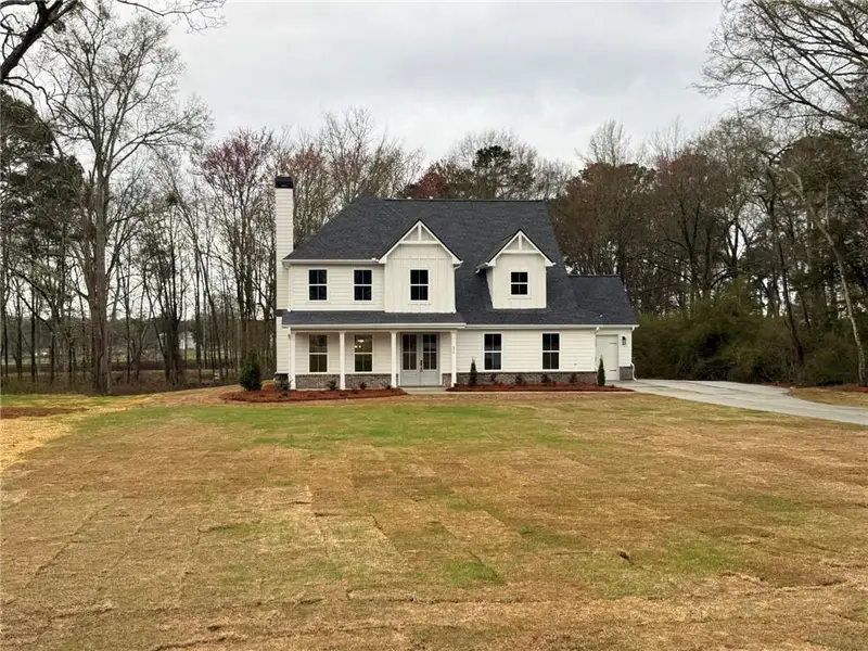 Front exterior of a new home in , Monroe, GA, highlighting curb appeal (Image 1). Front exterior of a new home in , Monroe, GA, highlighting curb appeal (Image 1).