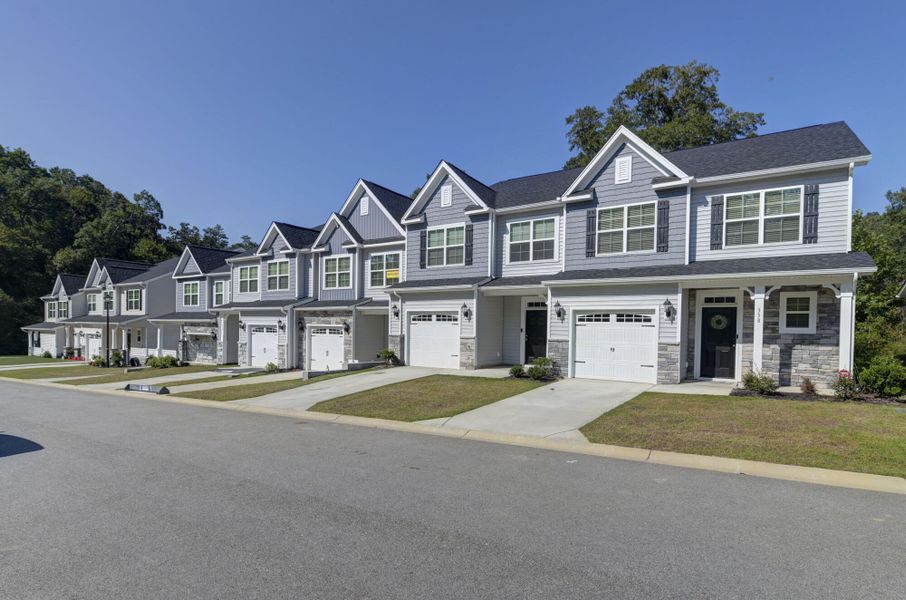 Front exterior of a new home in Kensington Place Townhomes, Lexington, SC, highlighting curb appeal (Image 24).