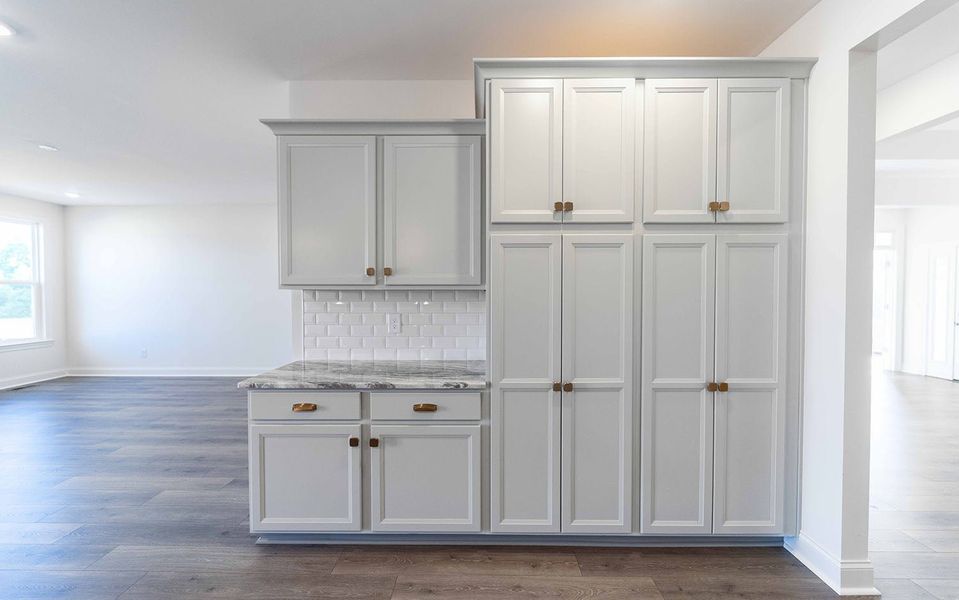 Furnished interior view inside a new home in Aden Woods, Fairview (Image 9).