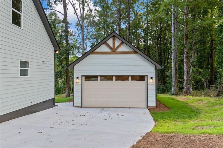 Front exterior of a new home in , Monroe, GA, highlighting curb appeal (Image 33).