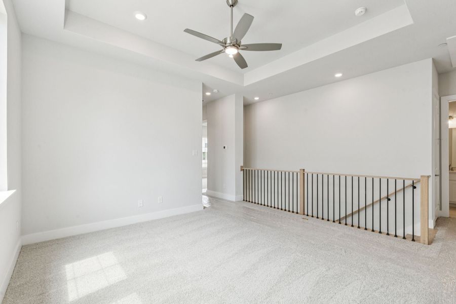 Representative unfurnished interior of a home built from the Hamilton by Centre Living Homes in Newman Village Townhomes, Frisco (Image 27).