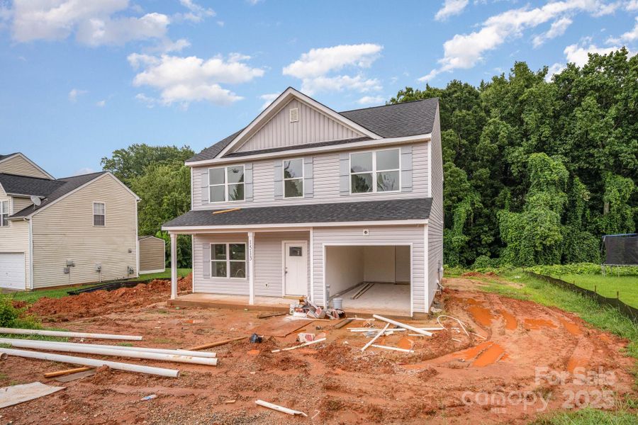 Front exterior of a new home in , Charlotte, NC, highlighting curb appeal (Image 1). Front exterior of a new home in , Charlotte, NC, highlighting curb appeal (Image 1).
