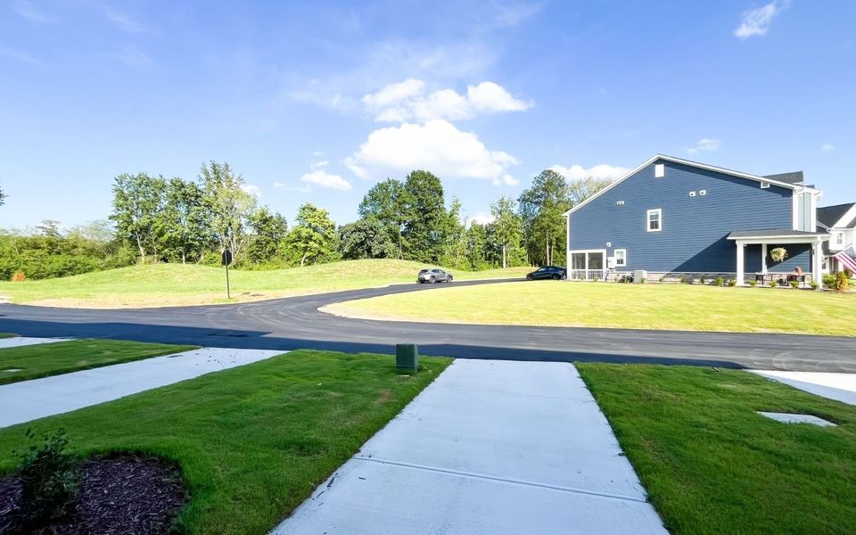 Front exterior of a new home in Wendell Falls, Wendell, NC, highlighting curb appeal (Image 15).
