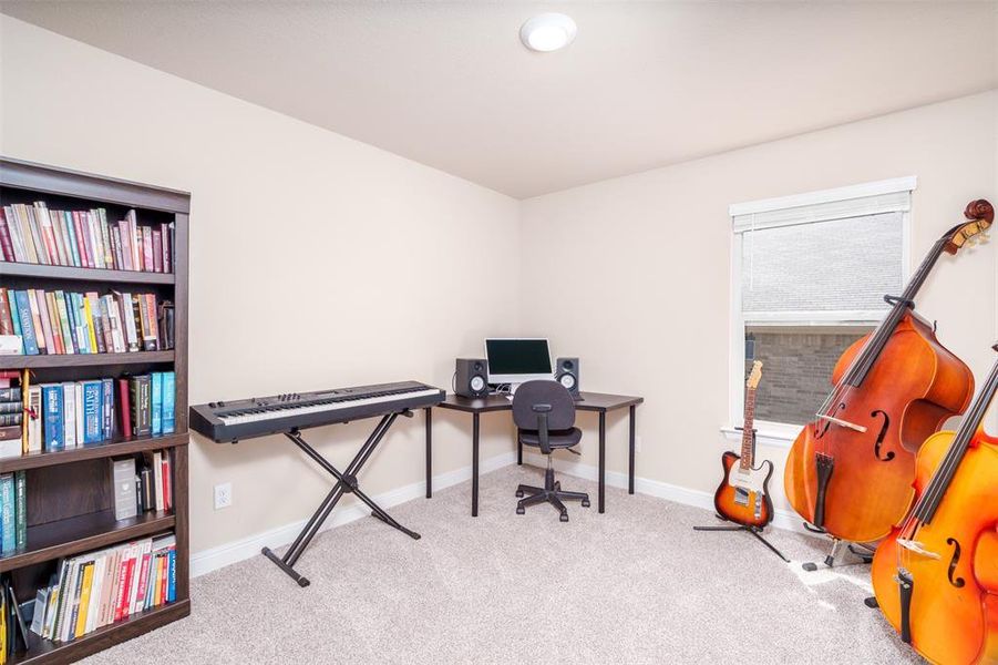 This 4th bedroom can be also used as an office, craft room, music room or guest room. It has a large walk-in closet.