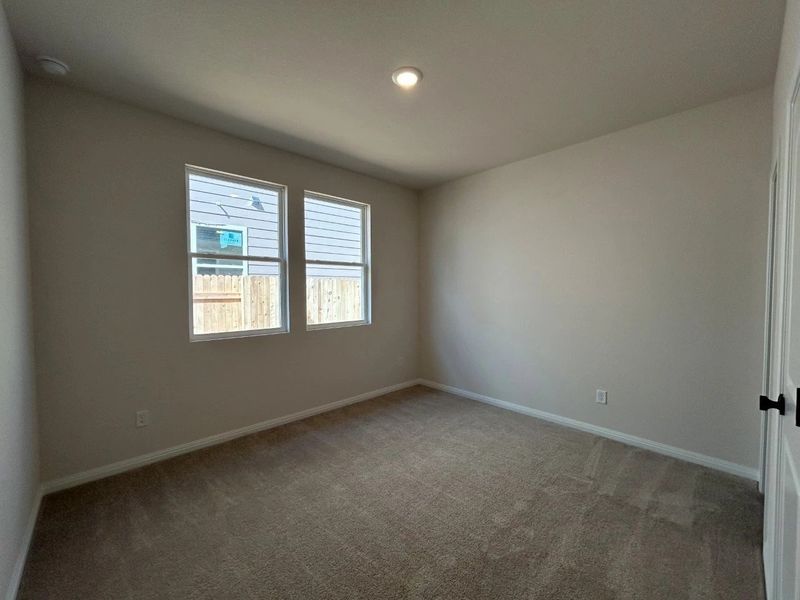 Spacious, unfurnished interior of a new home in Willow Springs, Buda (Image 17).
