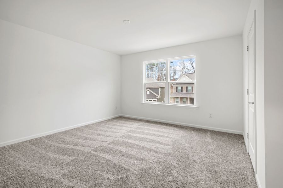 Spacious, unfurnished interior of a new home in Bryton, Huntersville (Image 25).