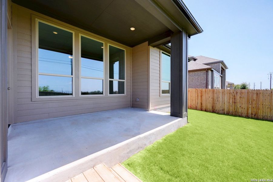 Exterior details and patio area of a home in Alsatian Oaks, Castroville (Image 2).