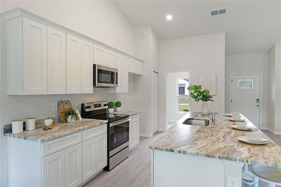 Furnished interior view inside a new home in , North Port (Image 13).