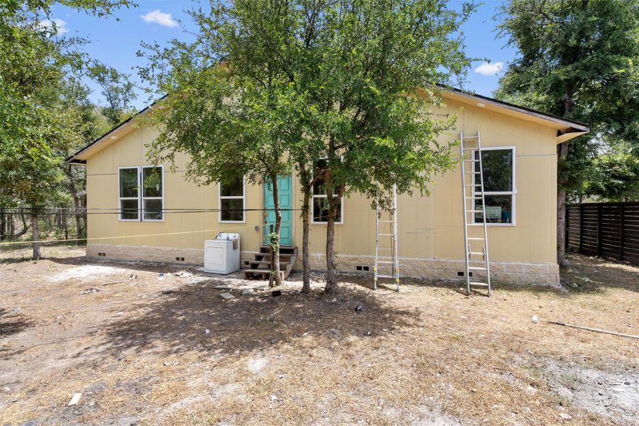 Back of property featuring crawl space Back of property featuring crawl space