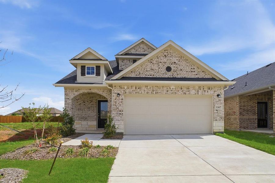 Front exterior of a new home in Westridge, McKinney, TX, highlighting curb appeal (Image 2).