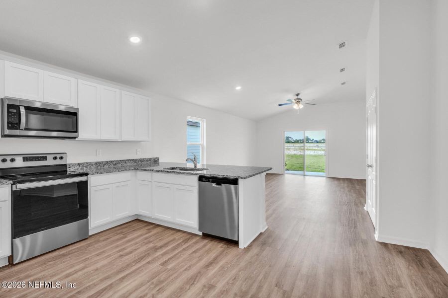 Furnished interior view inside a new home in Rolling Hills, Green Cove Springs (Image 5).
