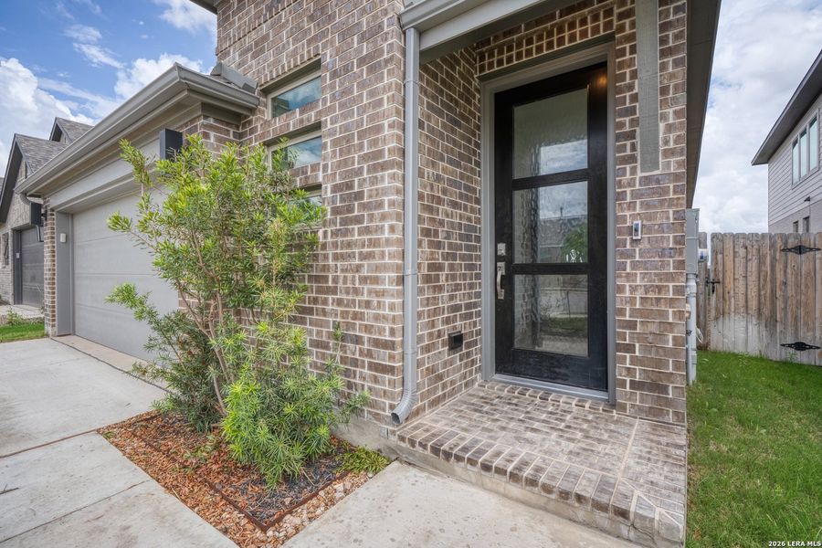 Exterior details and patio area of a home in Legacy at Lake Dunlap, New Braunfels (Image 20).