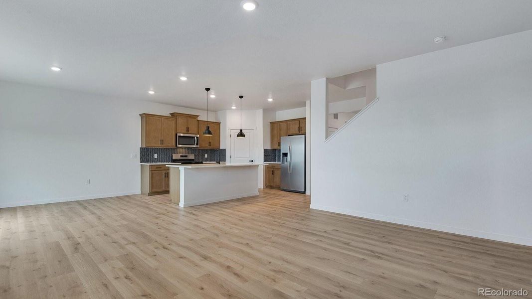 Spacious, unfurnished interior of a new home in Trails at Crowfoot, Parker (Image 27).