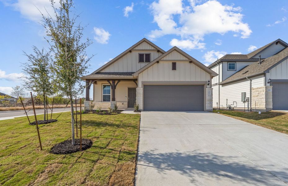 Front exterior of a new home in Patterson Ranch, Georgetown, TX, highlighting curb appeal (Image 1). Front exterior of a new home in Patterson Ranch, Georgetown, TX, highlighting curb appeal (Image 1).