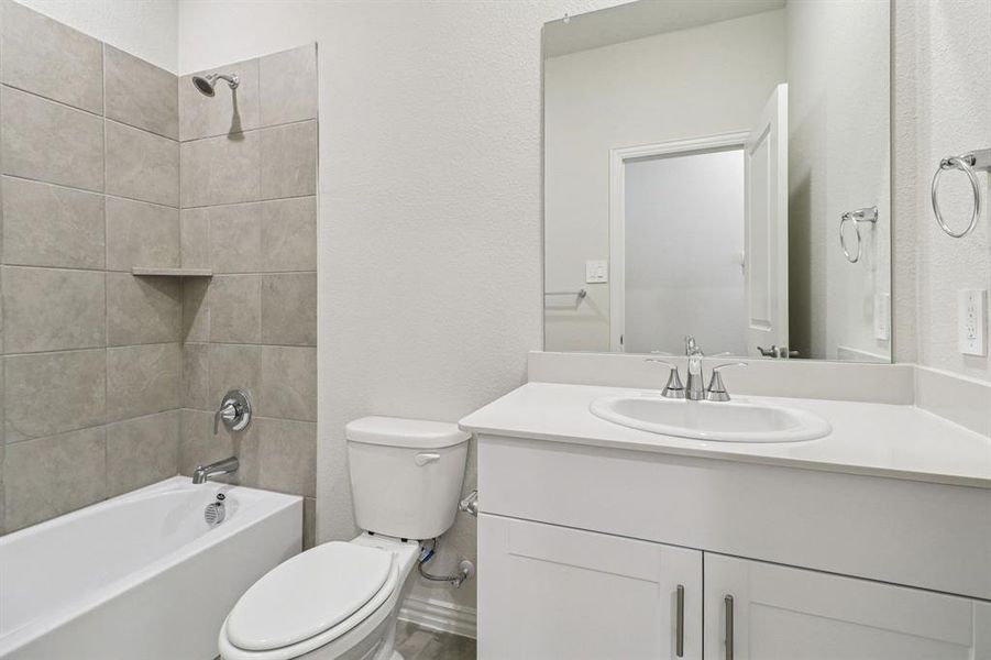 Photo is not of the actual home, but is an inspirational photo of builder’s model home and may depict options, furnishings, and/or decorator features that are not included.