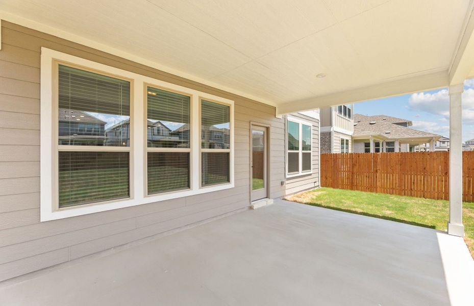 Exterior details and patio area of a home in Santa Rita Ranch, Liberty Hill (Image 19).