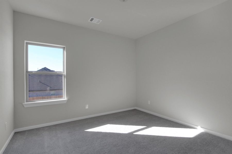 Spacious, unfurnished interior of a new home in Canterra Creek  60', Rosharon (Image 39).