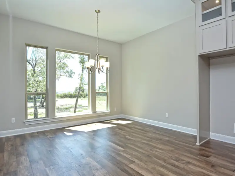 Representative unfurnished interior of a home built from the Santa Barbara II by Giddens Homes in Scofield Farms Estates, Georgetown (Image 98).