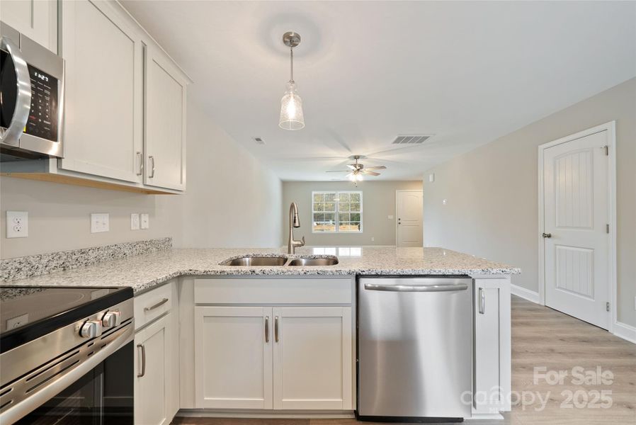 Furnished interior view inside a new home in , Monroe (Image 10).