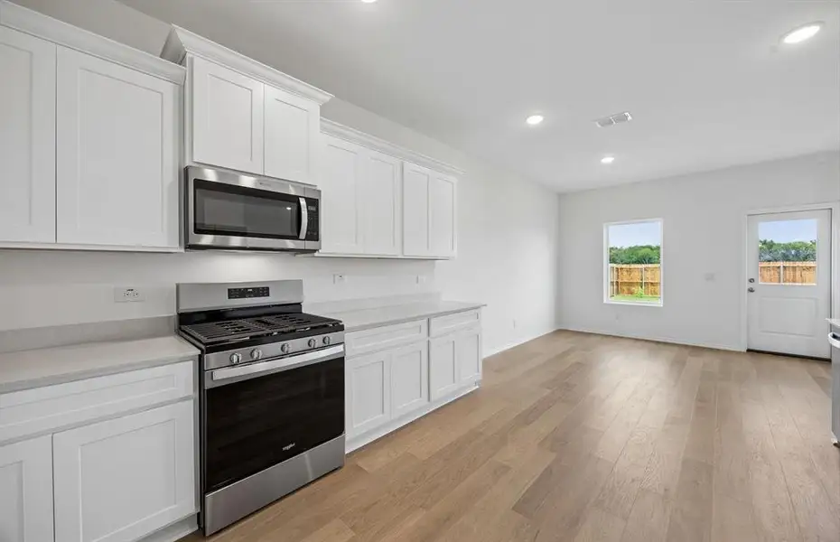 *Floorplan representation, not actual home - Dining area off kitchen with large windows