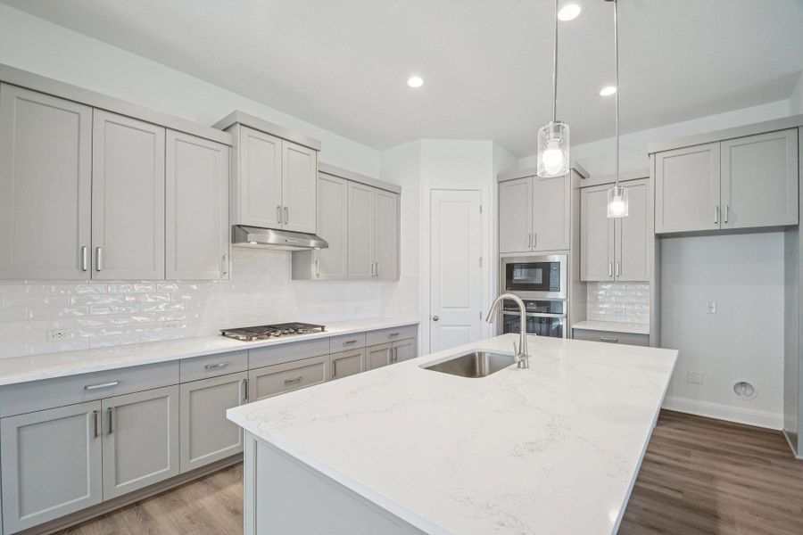 Furnished interior view inside a new home in 6 Creeks, Kyle (Image 10).