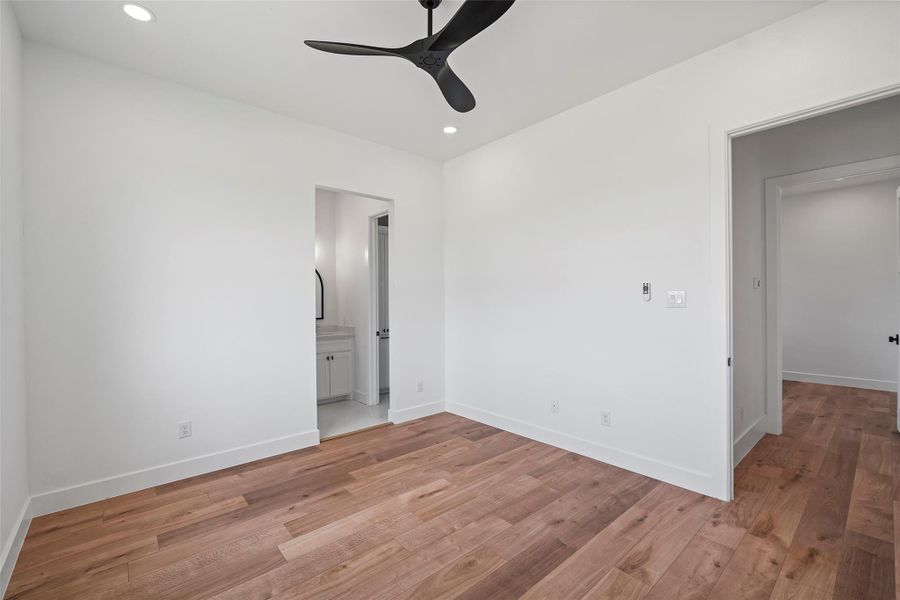 Cozy third bedroom with ample closet space and natural light.