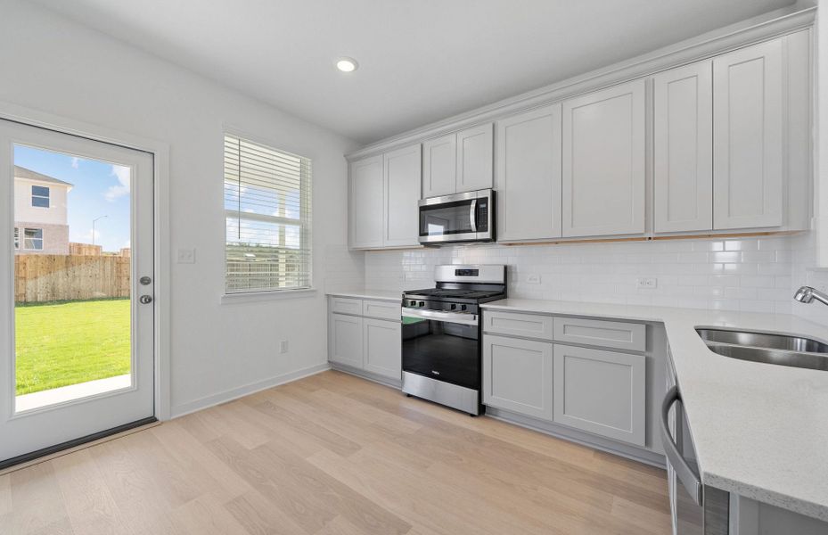 Furnished interior view inside a new home in Sunfield, Buda (Image 4).