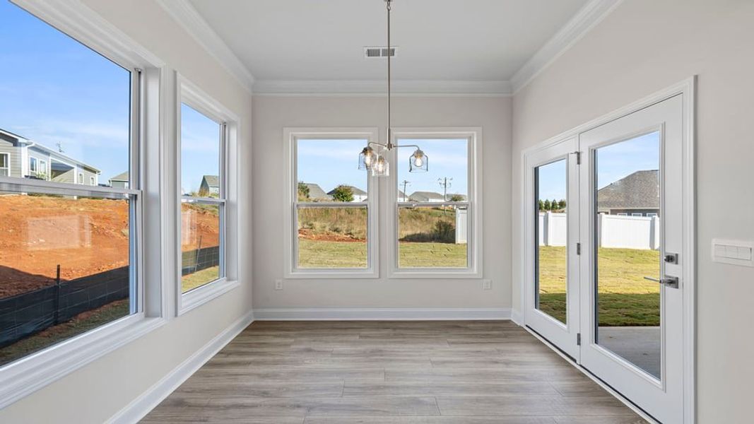 Spacious, unfurnished interior of a new home in Adams Glen, Greenville (Image 23).
