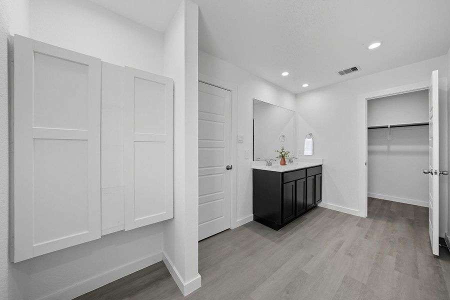 The sleek and modern touches in the home are carried throughout and help accent the additional storage.