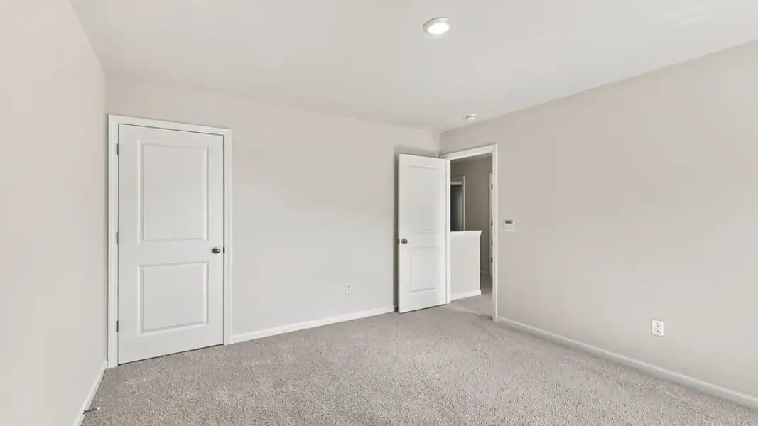Spacious, unfurnished interior of a new home in Rocky River Ridge, Anderson (Image 24).
