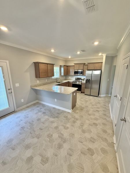 Furnished interior view inside a new home in Stone Fort Meadows, Manchester (Image 3).