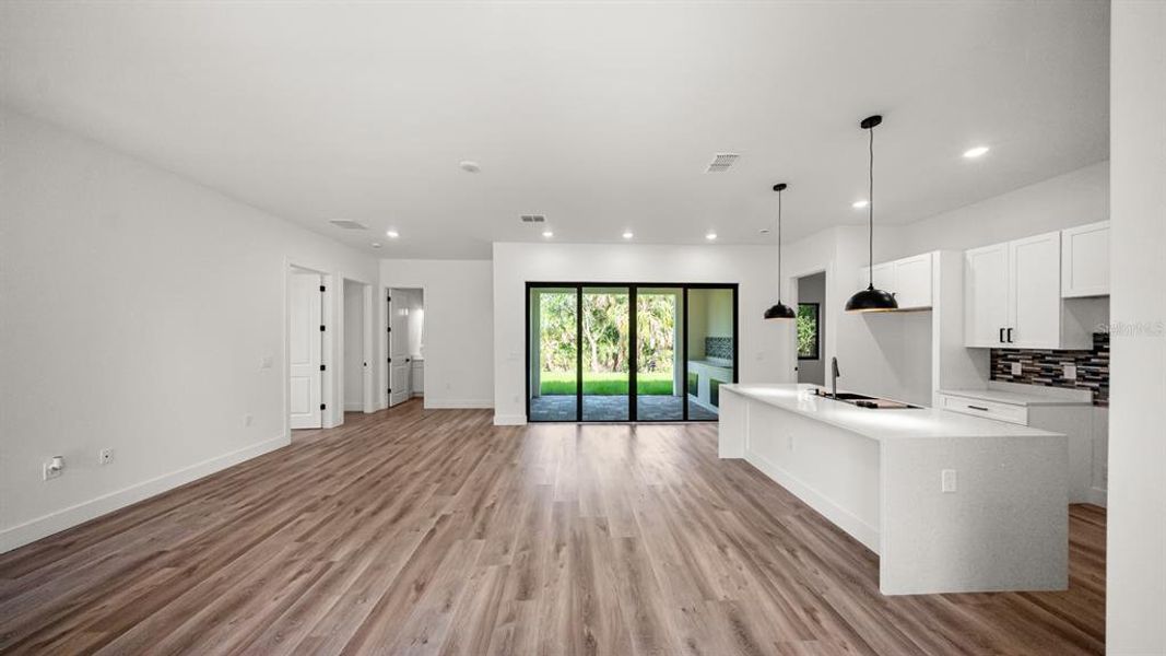 Spacious, unfurnished interior of a new home in , Port Charlotte (Image 26).