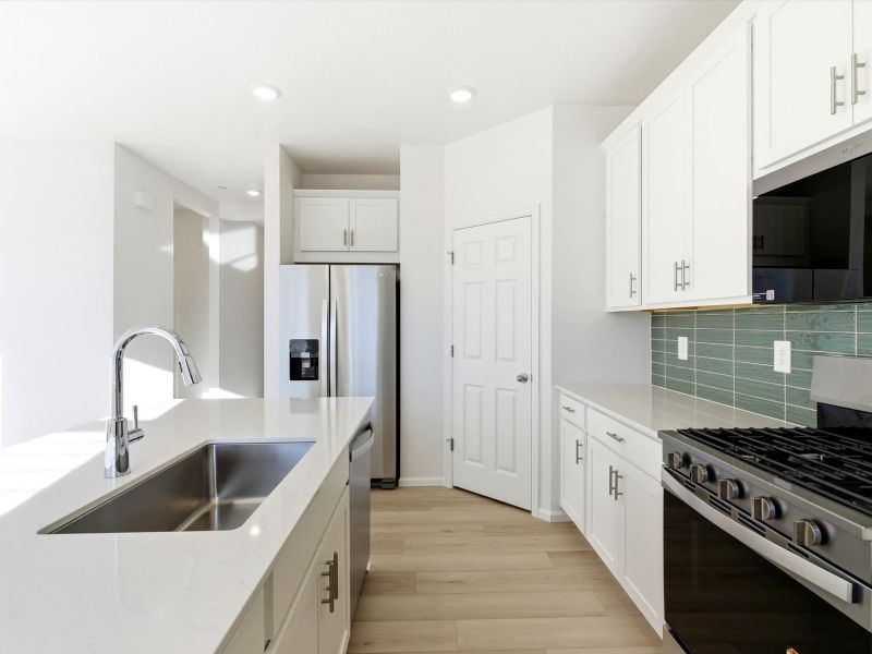 Furnished interior view inside a new home in Buffalo Highlands: The Flora Collection, Commerce City (Image 7).