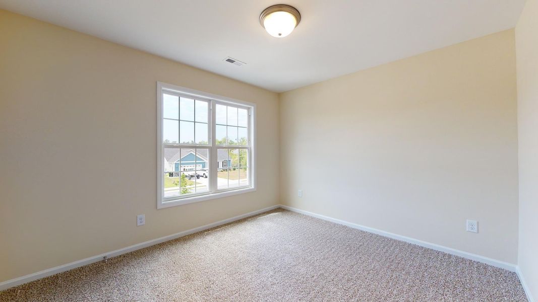 Representative unfurnished interior of a home built from the Fairfax A by JC Jackson Homes,LLC in Heritage Pointe, Newport (Image 21).