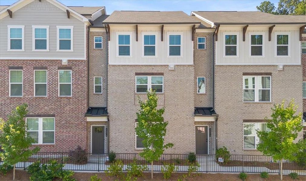 Front exterior of a new home in , Decatur, GA, highlighting curb appeal (Image 1).