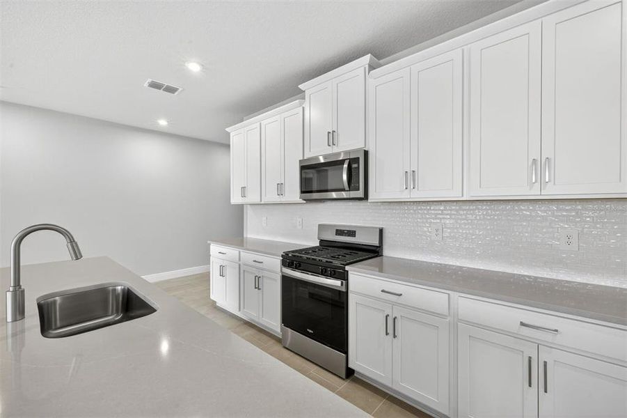 Furnished interior view inside a new home in Wellen Park, Venice (Image 5).