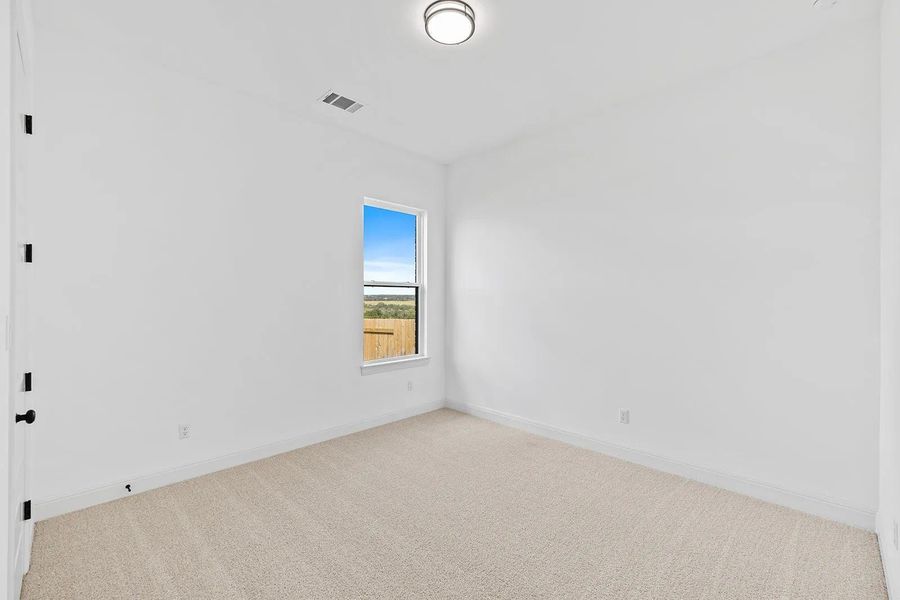 Spacious, unfurnished interior of a new home in Lariat - 70', Liberty Hill (Image 12).