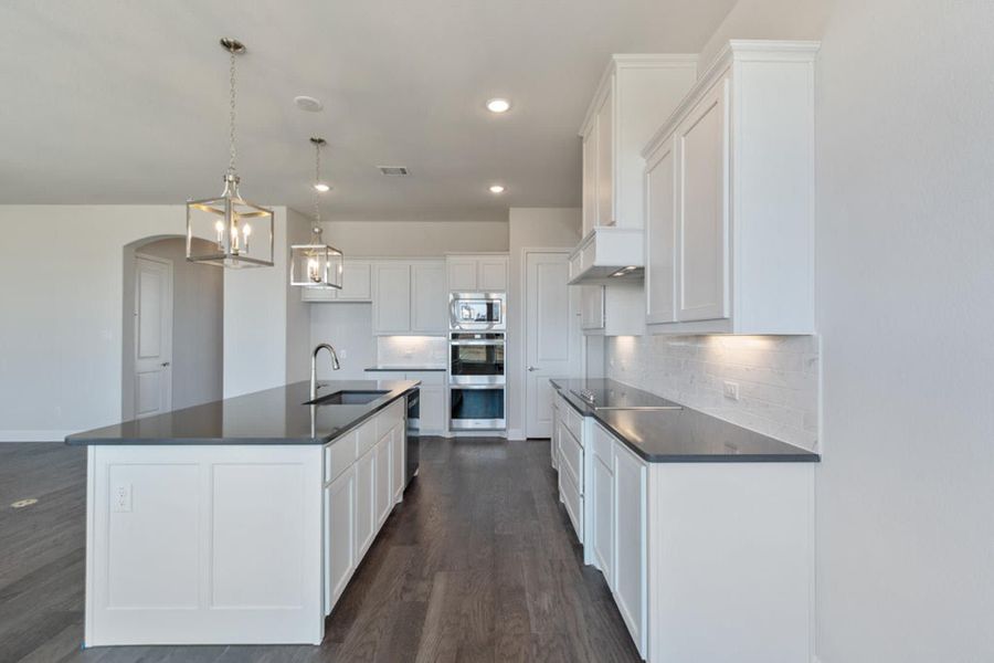 Kitchen | Concept 2406 at The Meadows in Gunter, TX by Landsea Homes