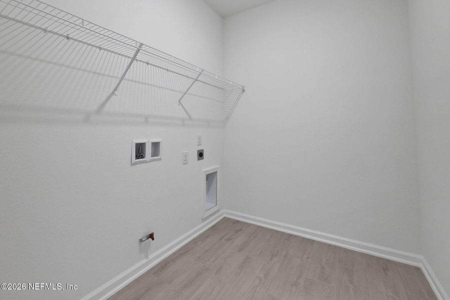 Spacious, unfurnished interior of a new home in Brook Forest, St. Augustine (Image 33).