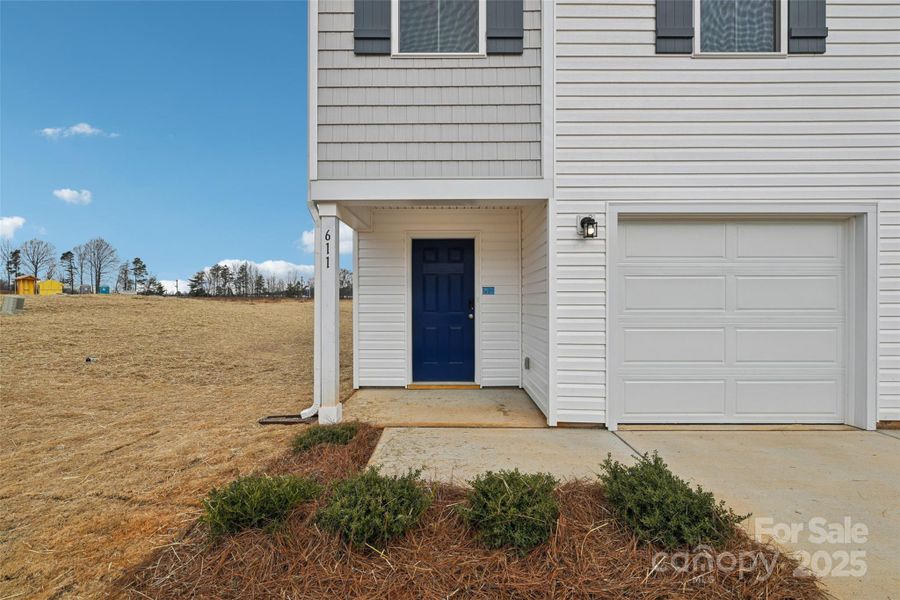 Exterior details and patio area of a home in The Towns at Green Needles, Lexington (Image 3).