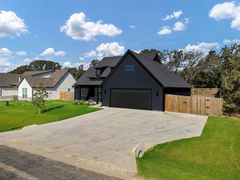 Front exterior of a new home in , Tolar, TX, highlighting curb appeal (Image 21).