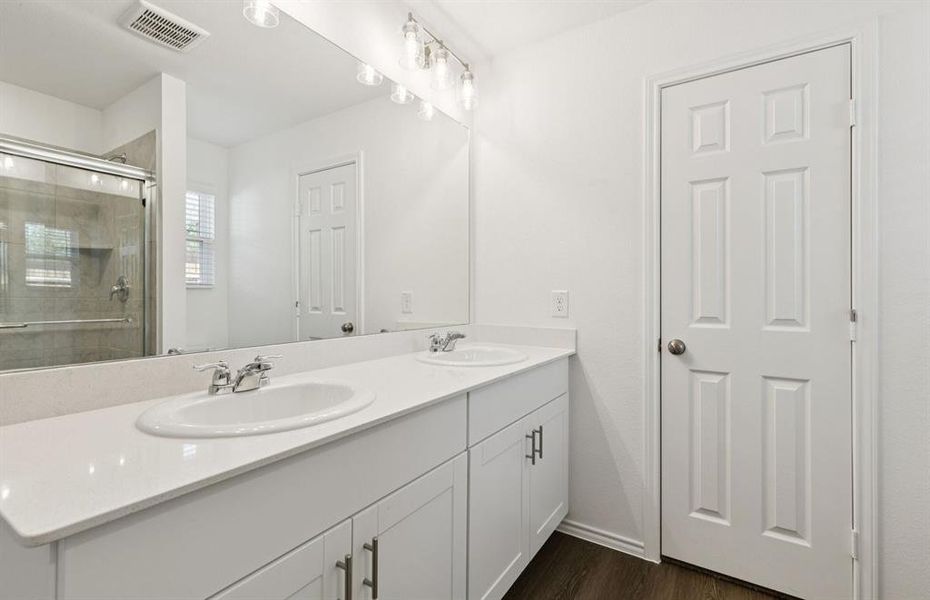 Owner's private bathroom with double vanity Owner's private bathroom with double vanity