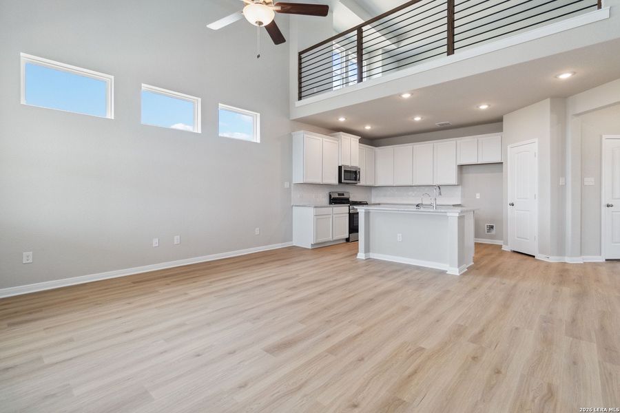 Spacious, unfurnished interior of a new home in Hunters Ranch, San Antonio (Image 8).