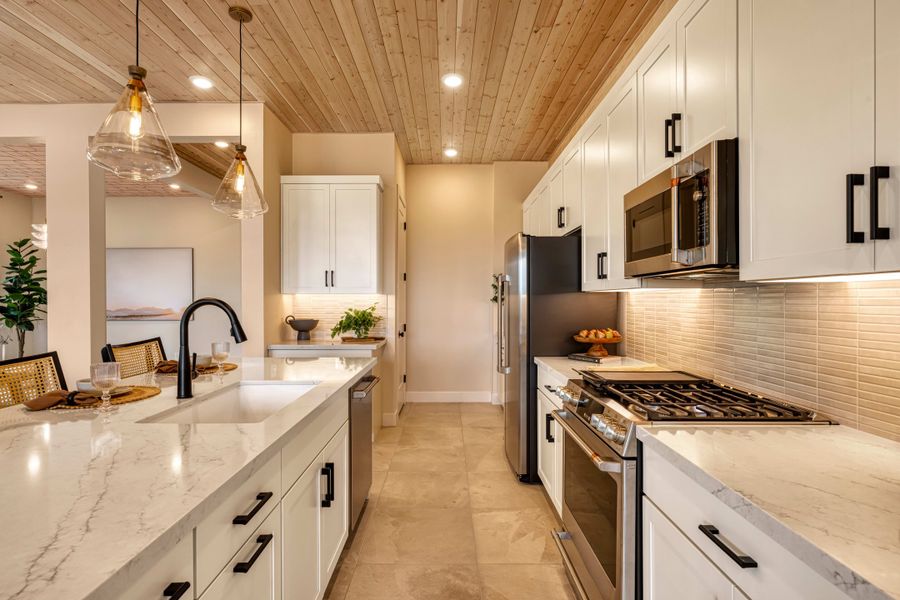 Representative furnished interior of a home built from the Rosemary Plan 40-2 by Tri Pointe Homes in Waterston Central, Gilbert (Image 5).
