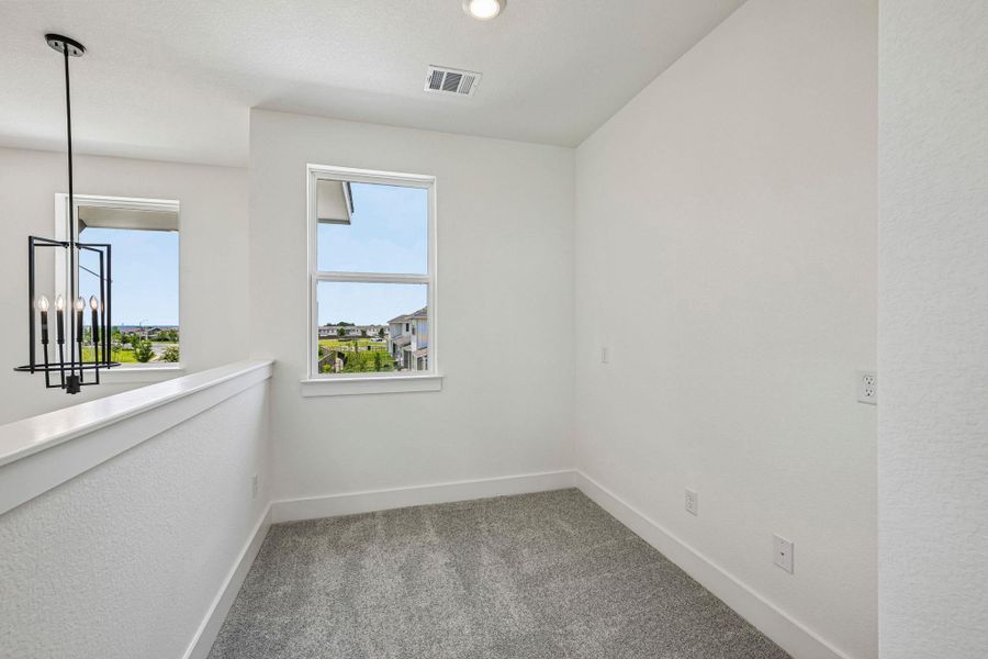 Spacious, unfurnished interior of a new home in Avery Centre, Round Rock (Image 34).